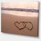 Designart - Two Hearts Drawn on the Beach - Extra Large Seascape Art Canvas